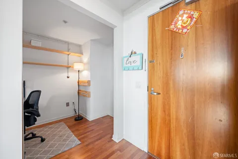 a view of a bathroom with a tub and shower