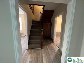 1924 Rt 212, Unit A Quakertown, PA 18951 - Photo 14 of 23 a view of entryway with wooden floor and stairs