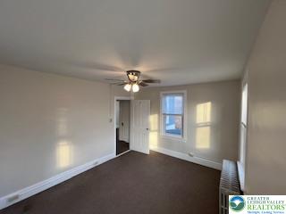 1924 Rt 212, Unit A Quakertown, PA 18951 - Photo 15 of 23 a view of an empty room with a window