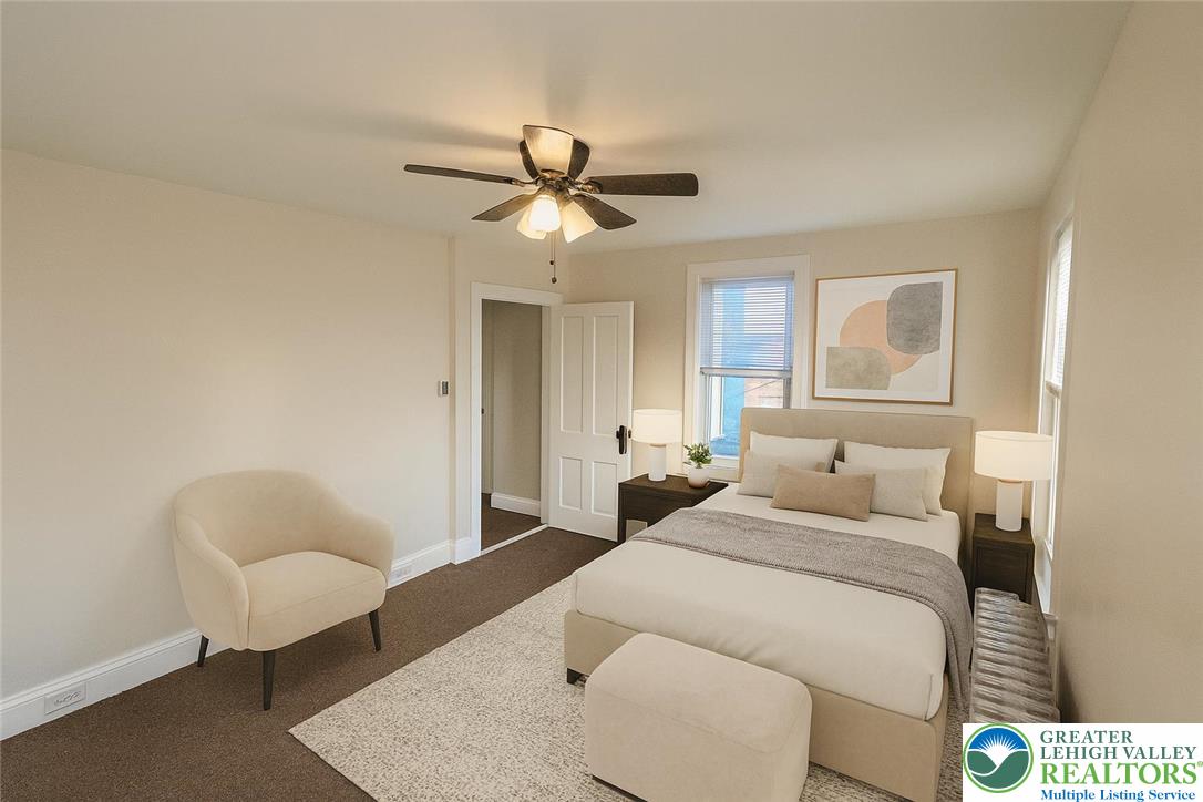 1924 Rt 212, Unit A Quakertown, PA 18951 - Photo 16 of 23 a bedroom with a bed and a couch