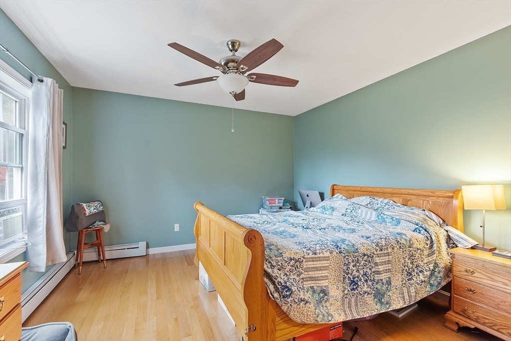 3 Gary Road Templeton, MA 01468 - Photo 11 of 22 a view of a bedroom with a bed and wooden floor