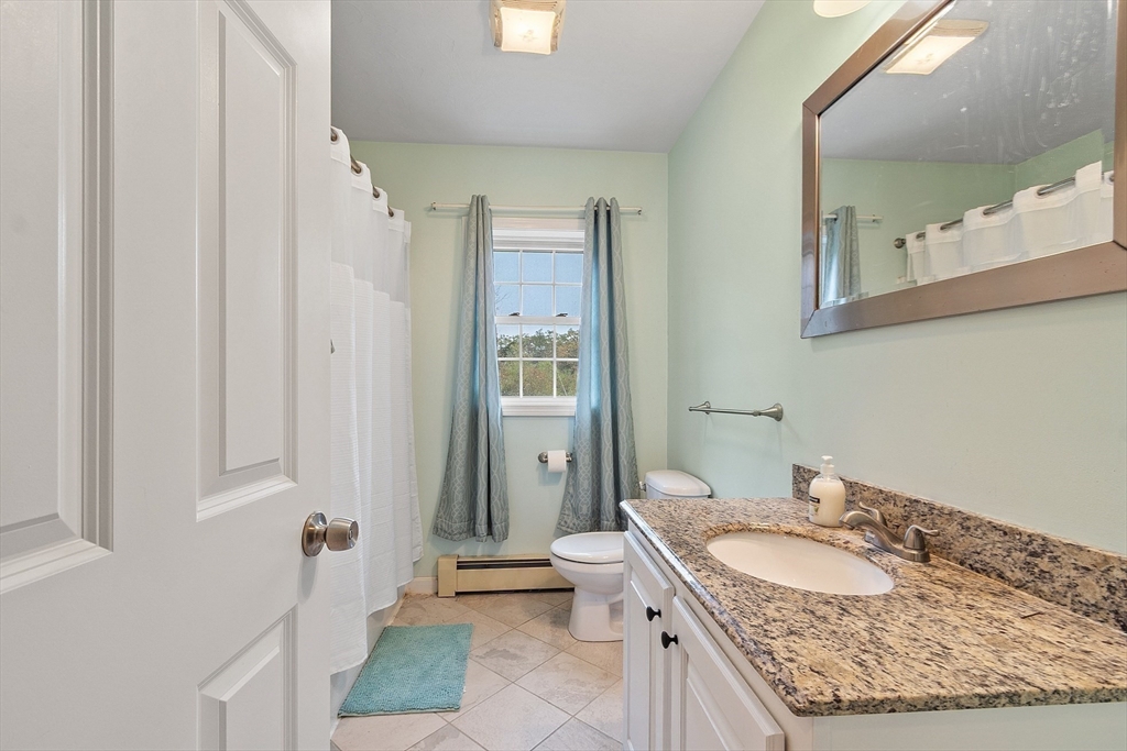 3 Gary Road Templeton, MA 01468 - Photo 15 of 22 a bathroom with a granite countertop sink and a mirror