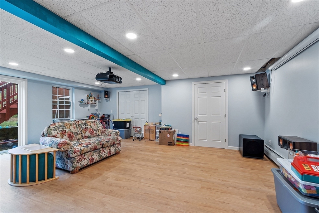 3 Gary Road Templeton, MA 01468 - Photo 17 of 22 a living room with furniture and a flat screen tv