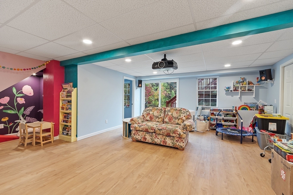 3 Gary Road Templeton, MA 01468 - Photo 18 of 22 a living room with furniture and a flat screen tv