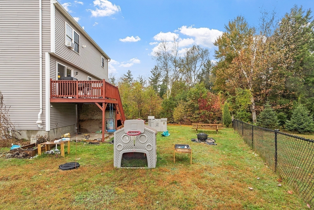 3 Gary Road Templeton, MA 01468 - Photo 21 of 22 a backyard of a house with table and chairs