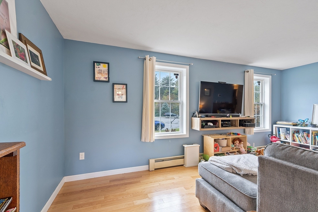 3 Gary Road Templeton, MA 01468 - Photo 4 of 22 a living room with furniture and a flat screen tv