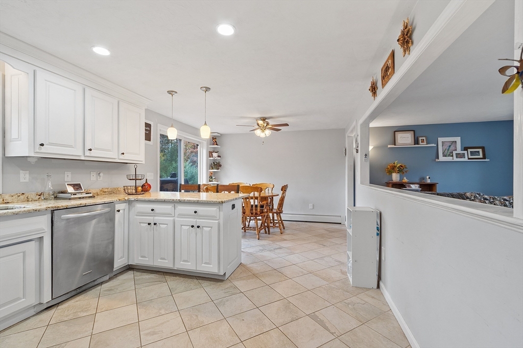 3 Gary Road Templeton, MA 01468 - Photo 7 of 22 a kitchen with cabinets and chairs