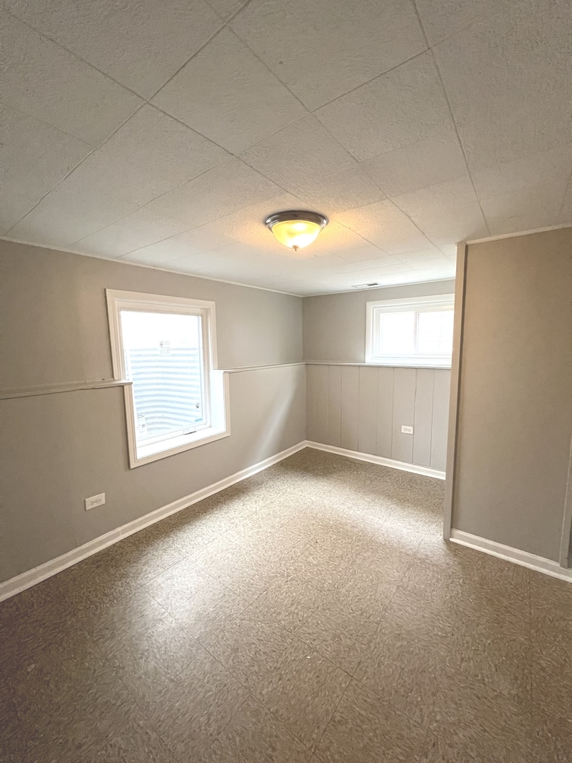 4409 Home Avenue Stickney, IL 60402 - Photo 17 of 21 an empty room with windows
