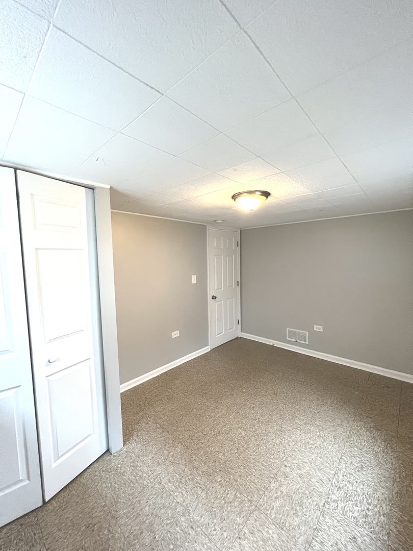 4409 Home Avenue Stickney, IL 60402 - Photo 18 of 21 an empty room with a empty space