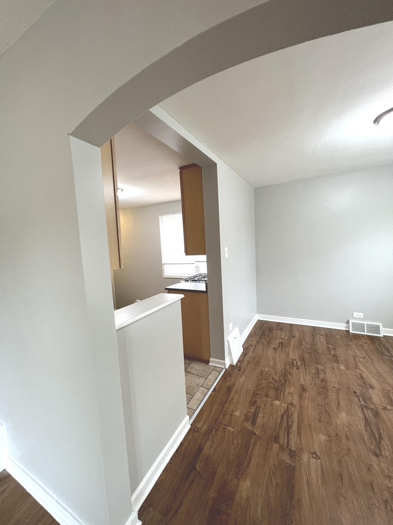 4409 Home Avenue Stickney, IL 60402 - Photo 5 of 21 a view of a kitchen cabinets and wooden floor