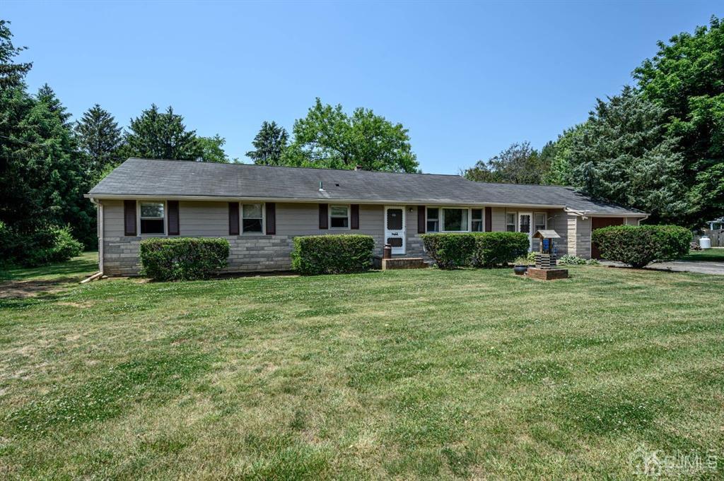 267 County Road 539 Cream Ridge, NJ 08514 - Photo 1 of 40 a front view of a house with a yard