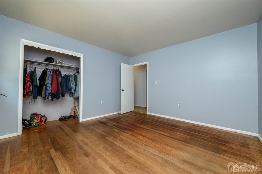 267 County Road 539 Cream Ridge, NJ 08514 - Photo 20 of 40 a bedroom with a bed and a mirror