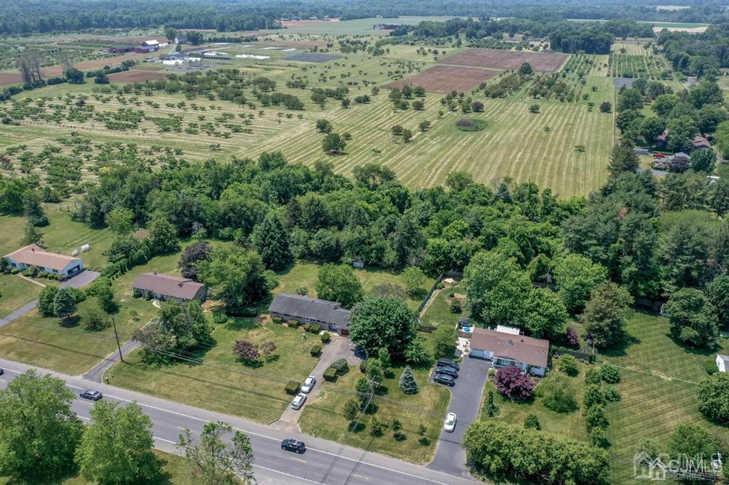 267 County Road 539 Cream Ridge, NJ 08514 - Photo 40 of 40 an aerial view of residential houses with outdoor space and trees