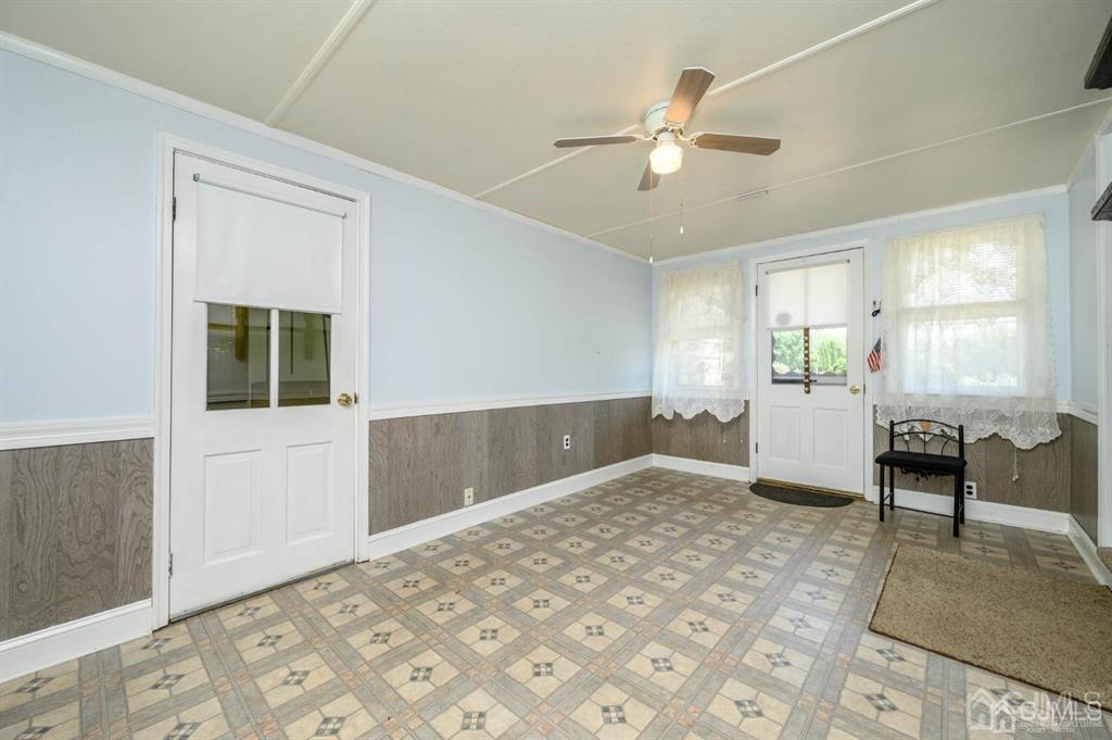 267 County Road 539 Cream Ridge, NJ 08514 - Photo 8 of 40 a living room with a bed furniture and a window