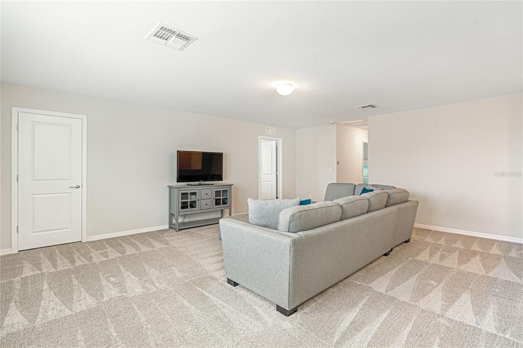 9095 Rally Spring Loop Wesley Chapel, FL 33545 - Photo 13 of 28
