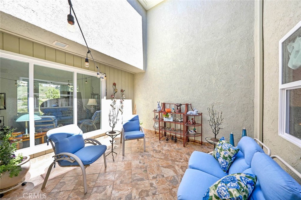 4 Lucerne, Unit 22 Newport Beach, CA 92660 - Photo 11 of 20 a outdoor living space with furniture