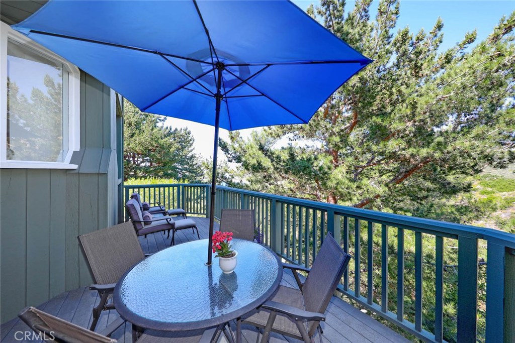 4 Lucerne, Unit 22 Newport Beach, CA 92660 - Photo 18 of 20 a view of a chair and table in the balcony