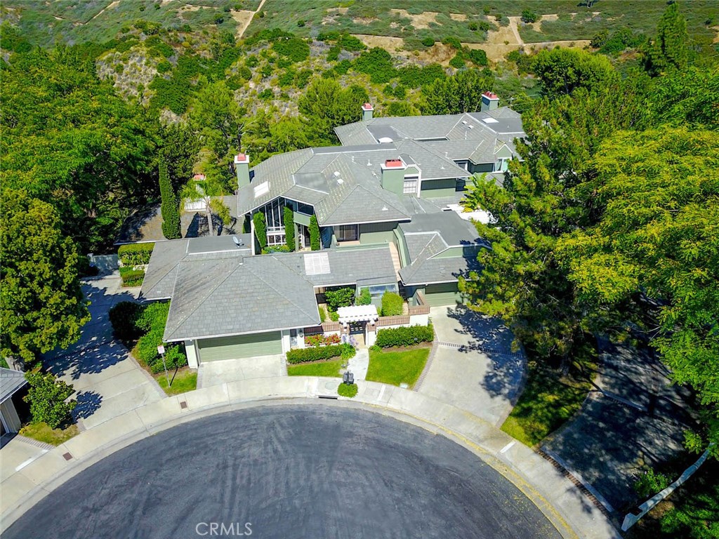 4 Lucerne, Unit 22 Newport Beach, CA 92660 - Photo 2 of 20 an aerial view of a house with a yard and sitting area