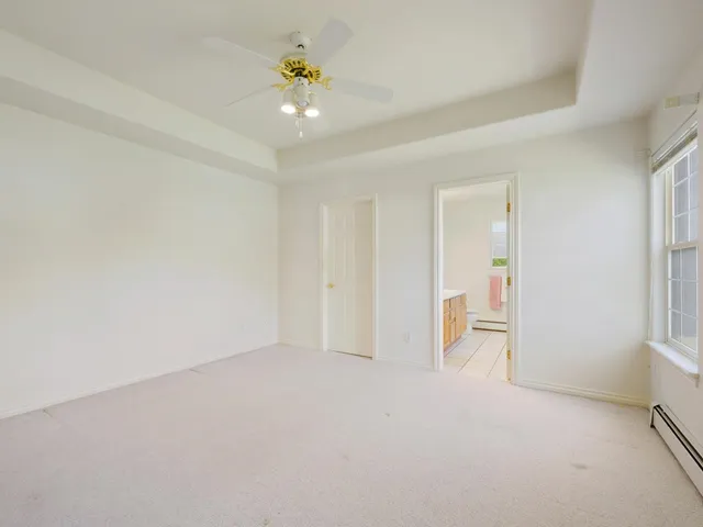 an empty room with a bathroom