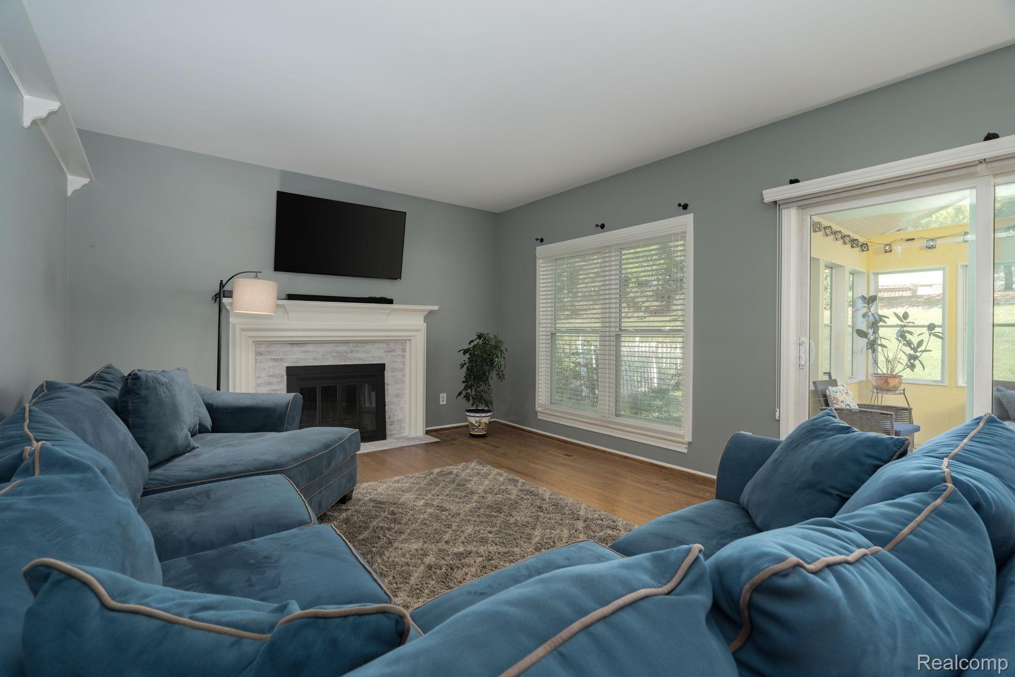 1639 Grandview Drive Rochester, MI 48306 - Photo 13 of 29 Family Room with gorgeous fireplace and doorwall to sunroom