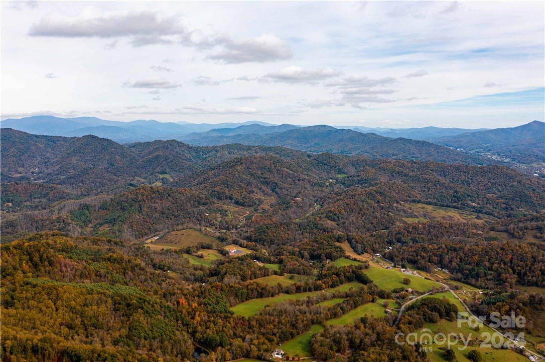 1375 Swing Road Burnsville, NC 28714 - Photo 11 of 48 an aerial view of houses covered in trees