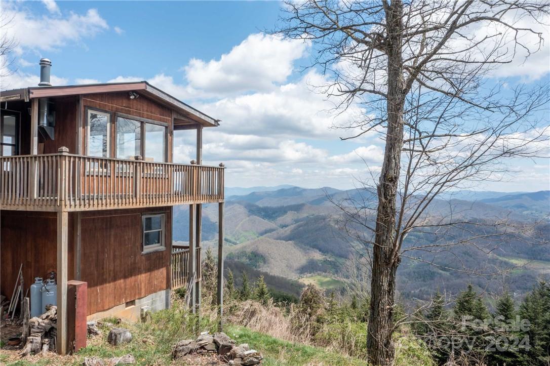1375 Swing Road Burnsville, NC 28714 - Photo 27 of 48 a front view of a house with garden