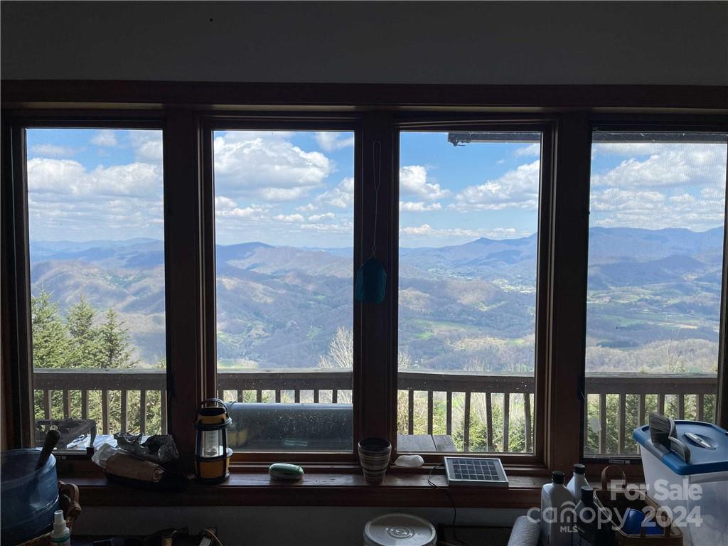 1375 Swing Road Burnsville, NC 28714 - Photo 32 of 48 a view of front door and deck