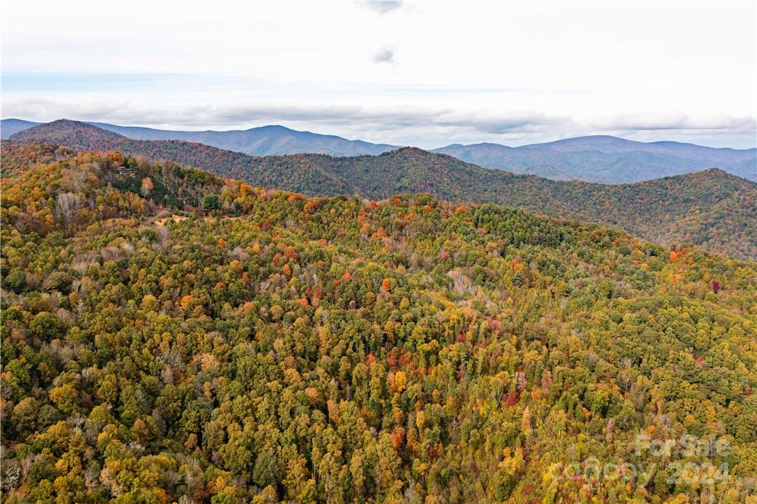 1375 Swing Road Burnsville, NC 28714 - Photo 7 of 48 a view of mountain with sunset in background