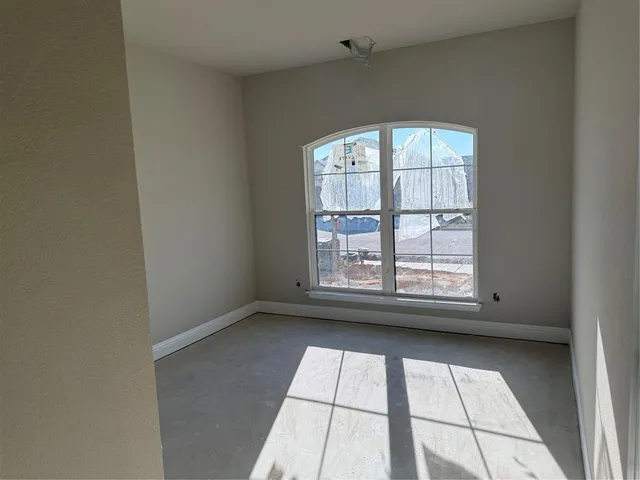 an empty room with window