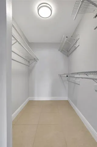 a view of a room with racks on the wall