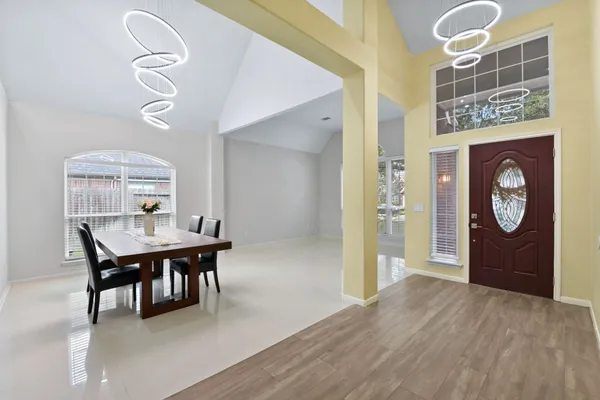 a view of a dining room with furniture