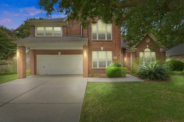 a house view with a garden space