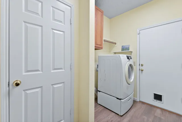 a view of a storage & utility room with washer and dryer