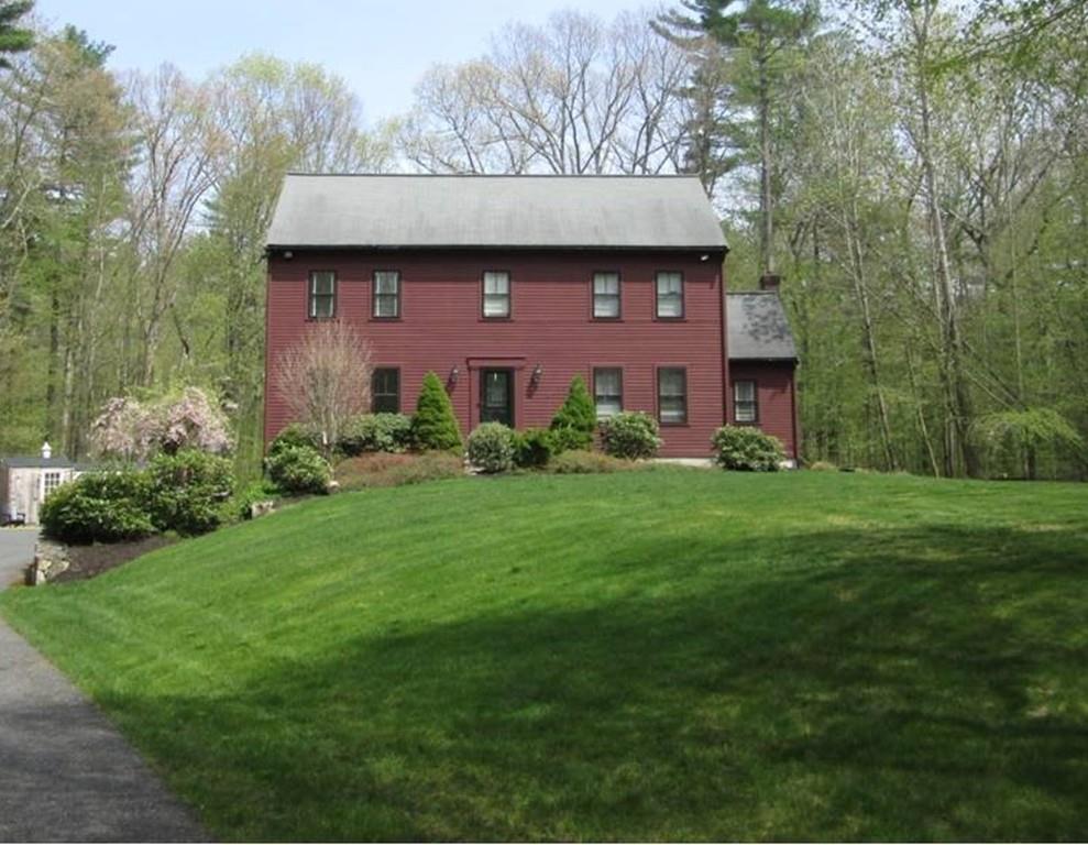 25 Crockett Road Upton, MA 01568 - Photo 1 of 39 a front view of a house with garden
