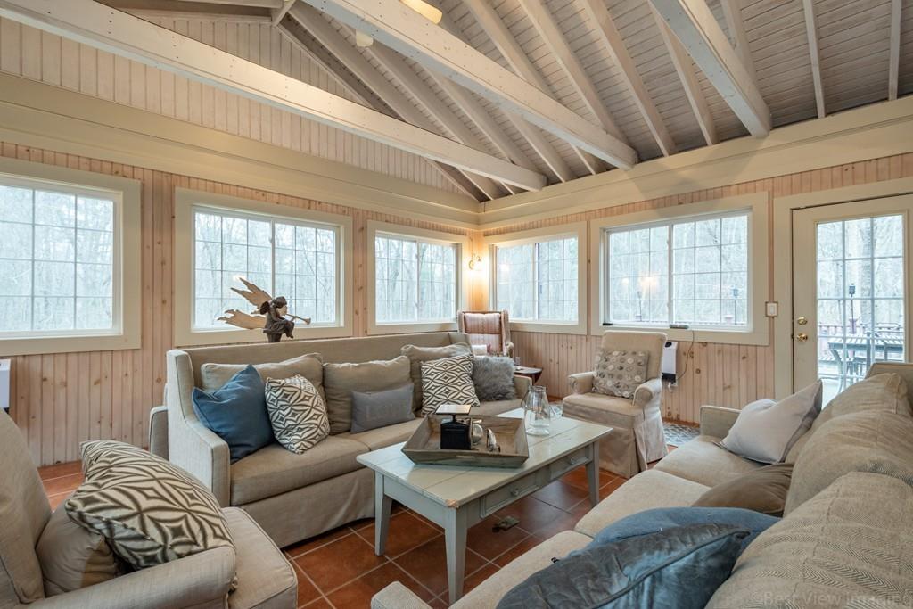 25 Crockett Road Upton, MA 01568 - Photo 19 of 39 a living room with furniture and a large window