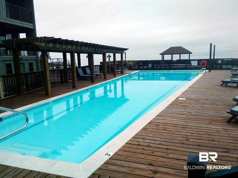 710 South Mobile Street, Unit 23 Fairhope, AL 36532 - Photo 36 of 42 Complex pool and deck
