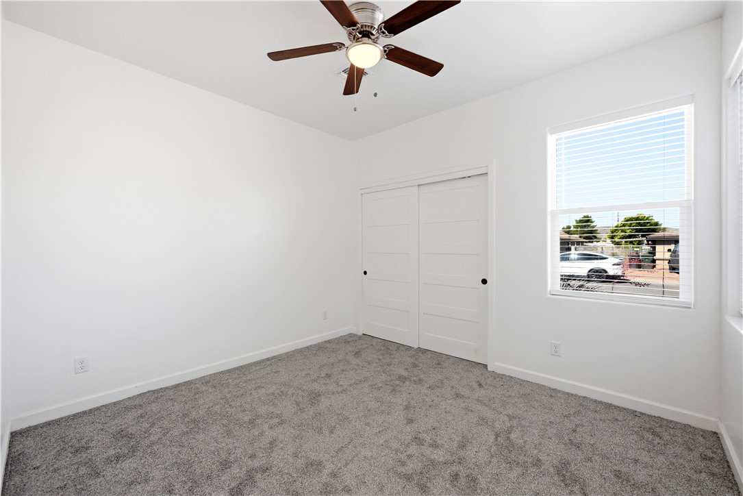 3546 North Skylark Road Kingman, AZ 86409 - Photo 14 of 30 an empty room with window and ceiling fan