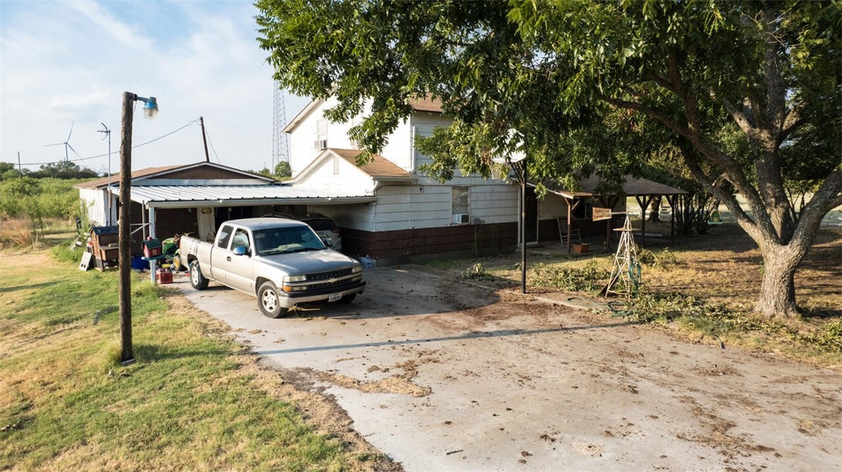 119 Hcr 3276 Rd Mount North Mount Calm, TX 76673 - Photo 14 of 20 a front view of a house with a yard