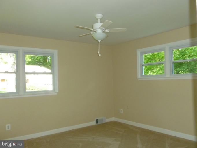 5209 Kipling Street Springfield, VA 22151 - Photo 14 of 29 an empty room with a window