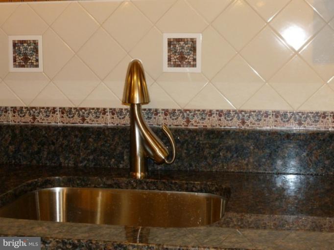 5209 Kipling Street Springfield, VA 22151 - Photo 22 of 29 a view of a sink in a kitchen
