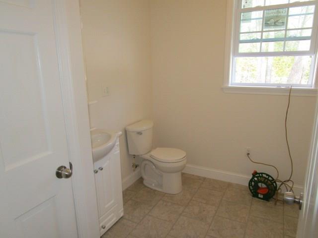 1113 Brewer Lake Road Orrington, ME 04474 - Photo 16 of 20 HALF BATH WITH LAUNDRY AREA