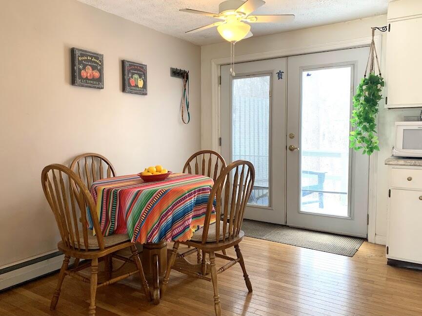 60 Brown Street, Unit 9 Kennebunk, ME 04043 - Photo 8 of 15 Dining Area, Door to Deck