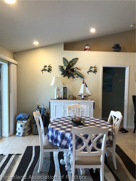 1208 Lakeside Way Sebring, FL 33875 - Photo 14 of 29 a view of a dining room with furniture