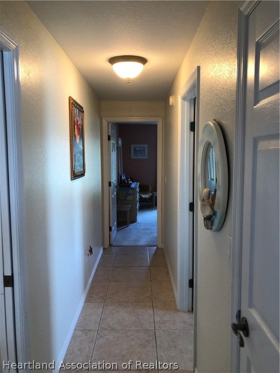 1208 Lakeside Way Sebring, FL 33875 - Photo 18 of 29 a view of a hallway view with staircase