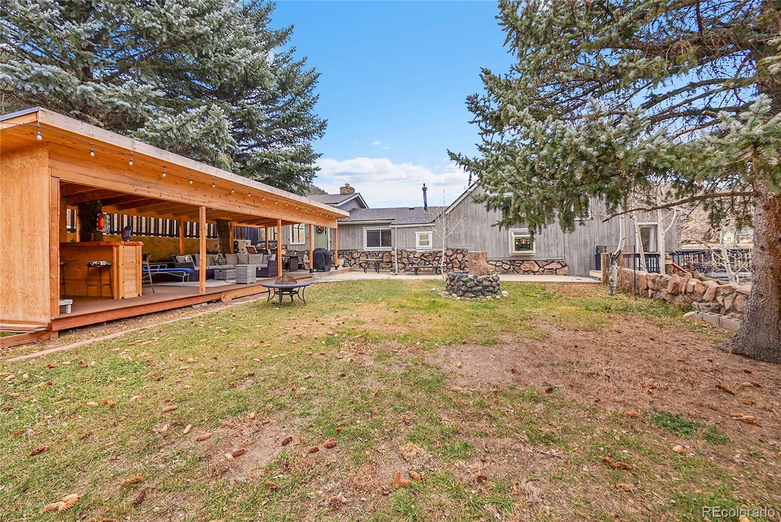 3645 Stanley Road Dumont, CO 80436 - Photo 26 of 40 a swimming pool view with a outdoor seating