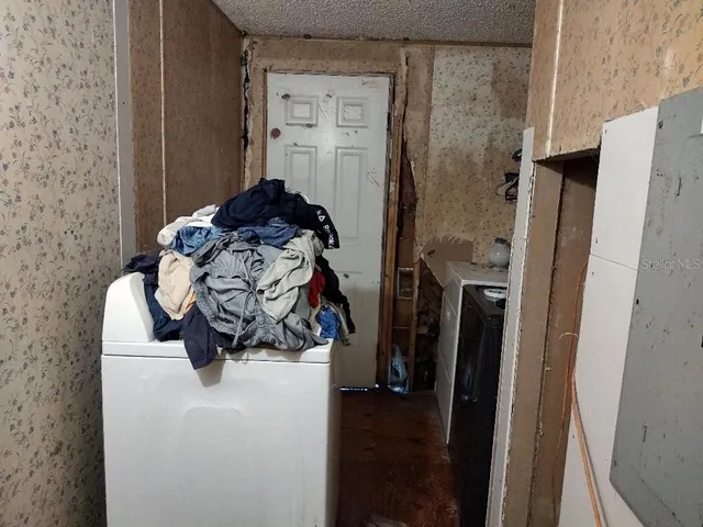 a bathroom with a sink a toilet and tub