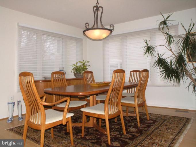 11200 Center Post Court Reston, VA 20194 - Photo 2 of 30 a dining room with furniture and window