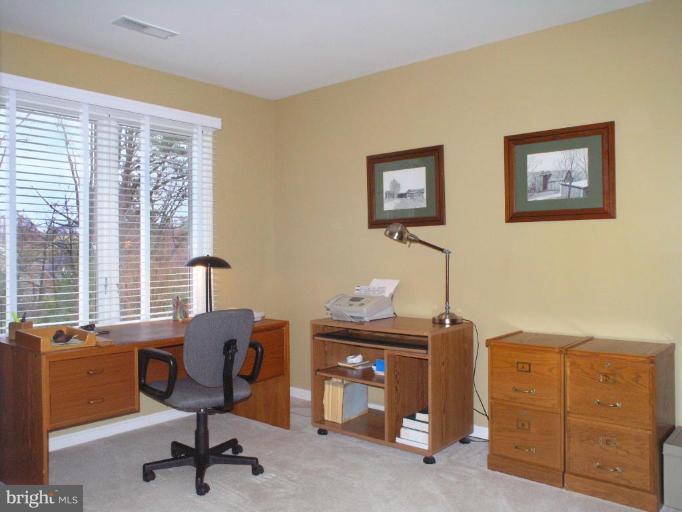 11200 Center Post Court Reston, VA 20194 - Photo 14 of 30 a view of a workspace with furniture and a window