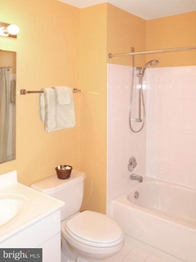 11200 Center Post Court Reston, VA 20194 - Photo 21 of 30 a bathroom with a shower a toilet and a sink