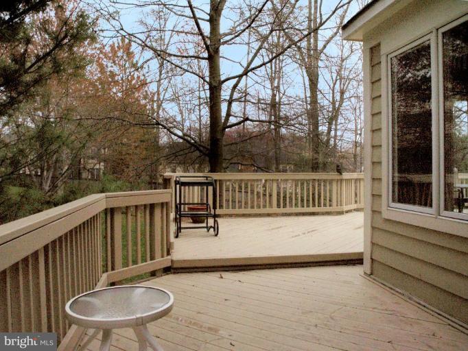 11200 Center Post Court Reston, VA 20194 - Photo 25 of 30 a view of a chair and table in the balcony
